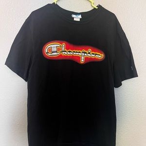 Black with orange font champion shirt
